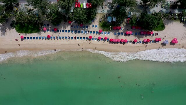 Top view patong beach Phuket Thailand, Amazing waves sea background. Crashing waves on beach sand, Beautiful sea background