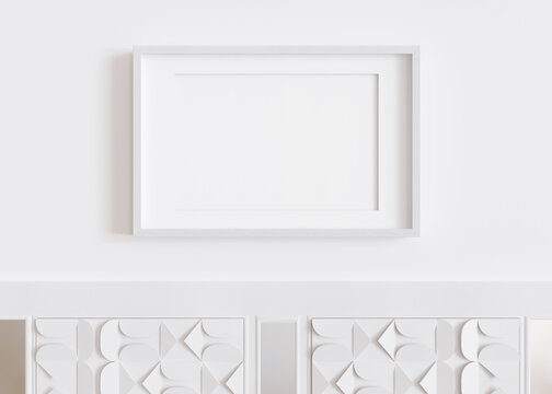 Blank horizontal picture frame hanging on white wall. Template, mock up for your artwork, picture or poster. Empty, copy space. Close up view. Simple, minimalist mockup. 3D rendering.
