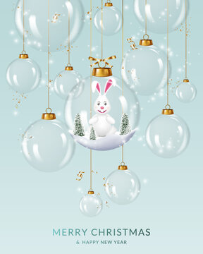 Christmas and New Year greeting card with transparent christmas balls with cute rabbit.