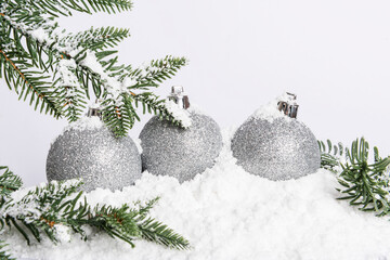 
christmas balls in the snow