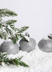 
christmas balls in the snow
