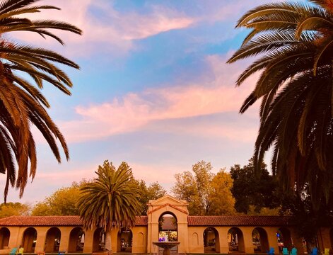 Low angle shot of a building of the Stanford University at sunset in Palo Alto