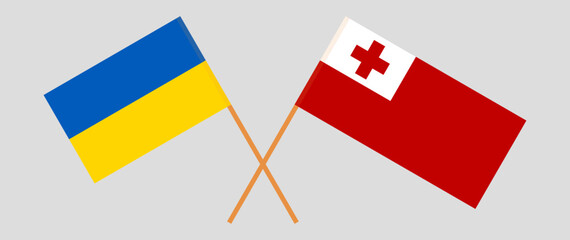 Crossed flags of Ukraine and Tonga. Official colors. Correct proportion