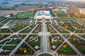 Aerial view on baroque garden of Rundale palace in autumn time. Symmetrical park in vibrant colors - obrazy, fototapety, plakaty