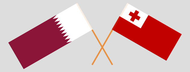 Crossed flags of Qatar and Tonga. Official colors. Correct proportion