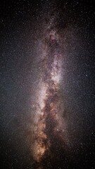 Vertical of the Milky Way galaxy with stars and space dust in the universe.