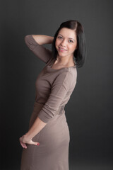 Fototapeta premium portrait of a cheerful girl in a dress