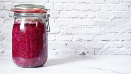 Red cabbage in a ferment jar with copy space