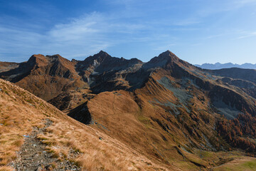 the nature and alpine landscapes of the Val Tartano and the Orobie Valtellinesi park, during an autumn day, near the village of Tartano, Italy - November 2022.