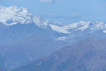 the nature and alpine landscapes of the Val Tartano and the Orobie Valtellinesi park, during an autumn day, near the village of Tartano, Italy - November 2022.