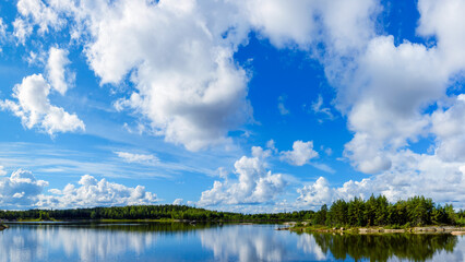 Fototapeta na wymiar A beautiful summer day in Finland. Panoramic view of Hauninen reservoir, Raisio in mid-summer.