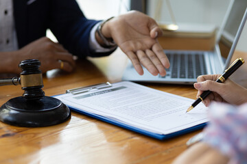Fototapeta premium The lawyer explained the conditions in the contract document. Signing a legal contract agreement.