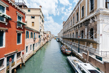 Fototapeta na wymiar Boats in a Venetian canal