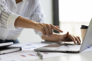 Business woman working on laptop, modern accounting concepts.