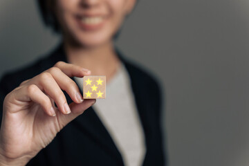 Stars on the hand. Rating after service. Appraisal. Business rating concept...