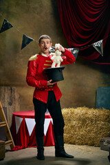 Magician. Vintage portrait of male retro circus entertainer expresses rejoice and announces start...
