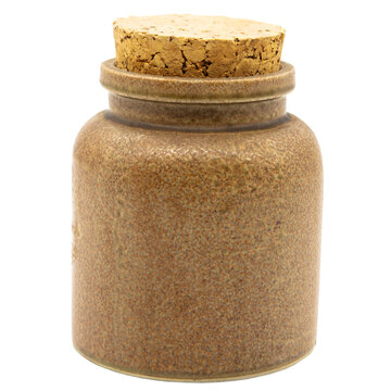 a single brown clay cup or bottle with cork