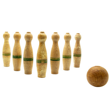 wooden bowling pins and a ball