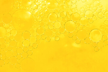 Bubbles of vegetable oil or fat in water. Olive oil in liquid