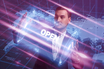 Business, Technology, Internet and network concept. Young businessman working on a virtual screen of the future and sees the inscription: Open