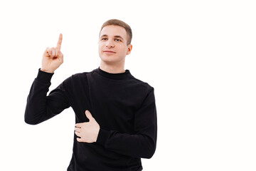 a man in black clothes points his finger at something on a white background.