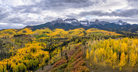 Naklejka na ściany i meble Rocky Mountains - Autumn golden aspen foliage near Ridgway Colorado - County Road 5 - Mount Sneffels - San Juan Mountains