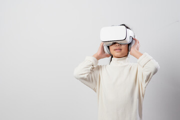 Asian little girl with virtual reality headset. Innovation technology and education concept