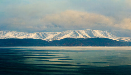 Stunning lake baikal in winter snowy mountain with cloudy sky
