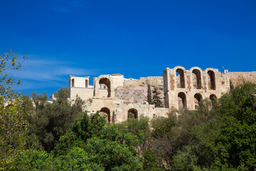 Fototapeta na wymiar Historic Landmark, Odeon of Herodes Atticus, in the Acropolis of Athens, Greece. Sunny Day