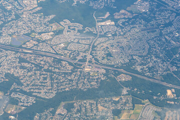 Aerial view of route interstate highway and housing developments in the Eastern, United States