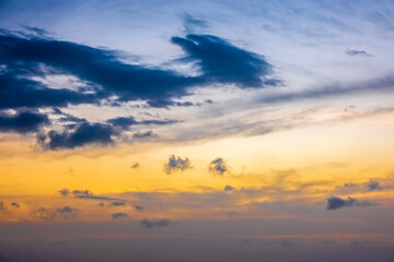 Calm sea with sunset sky and sun through the clouds over. Meditation ocean and sky background. Tranquil seascape. Horizon over the water