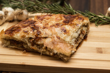 Savoury slice of pie with meat