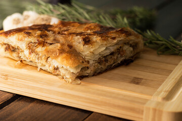 Savoury slice of pie with meat