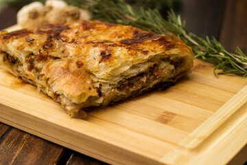 Savoury slice of pie with meat