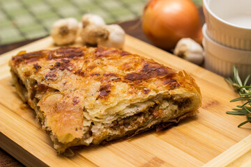 Savoury slice of pie with meat