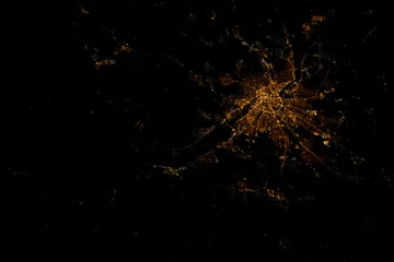 Fotobehang Night aerial space view over Budapest, Hungary seen from space. City lights light up the area. Digitally enhanced. The elements of this image furnished by NASA. © Blue