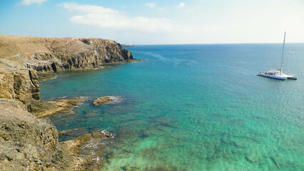 Yacht close to Lanzarote island coast.