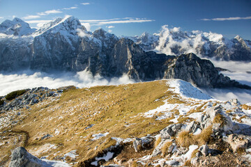 Julian Alps Slovenia, peak Debela Pec 2014 m, winter hiking in Triglav with snowy peaks and mist 