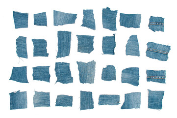 Rows of  grunge denim patches on white background
