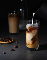 Cold coffee with ice in low key	