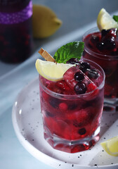 Cold refreshing drink with fresh berry and ice