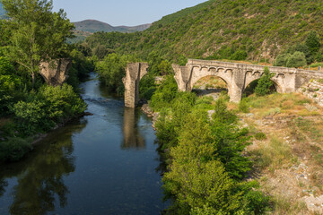 Fototapeta na wymiar Scenic bridge over the Golo river in northern Corse, France.