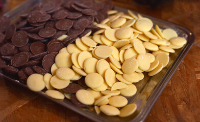 Milk and white chocolate on a plate