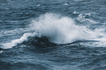 Wave in an ocean storm on a cold winter day