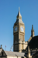 Fototapeta na wymiar The famous Big Ben clock tower against a blue sky in London, England