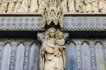 Statues on the facade of the Westminster Abbey Cathedral in London, England