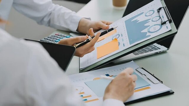 Businessman working with smart phone and laptop and digital tablet computer in office with digital marketing media in virtual icon	