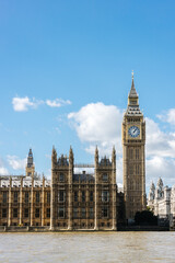 Fototapeta na wymiar The famous Big Ben clock tower against a blue sky in London, England
