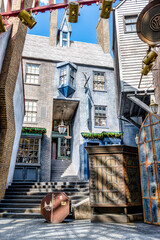 Fototapeta premium Orlando, Florida, United States. November 15 2022. Harry Potter Diagon Alley attraction at Universal Studios with Christmas season decorations.