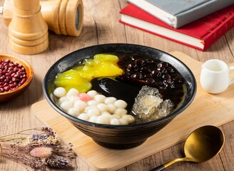 Taiwan sweet mango, soybean, jelly, tofu and black and white served in bowl isolated on table top view of asian food